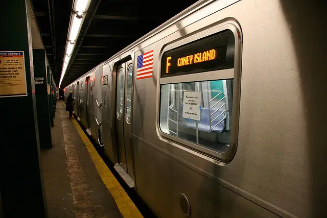 The F train pulling into Carroll Street Station